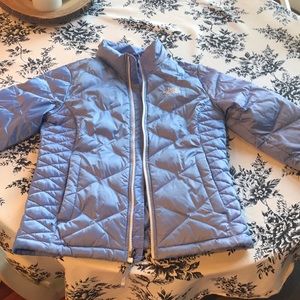 Blue North face quilted jacket